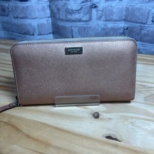 kate spade newbury lane neda rose gold saffiano leather zip around wallet